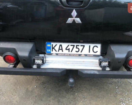 Чорний Міцубісі Л 200, об'ємом двигуна 2.48 л та пробігом 330 тис. км за 11800 $, фото 5 на Automoto.ua