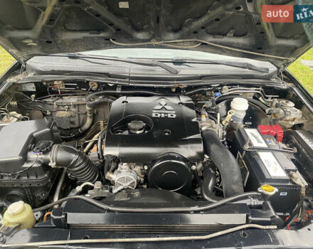 Черный Мицубиси Л 200, объемом двигателя 0 л и пробегом 409 тыс. км за 9500 $, фото 9 на Automoto.ua