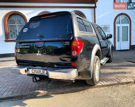 Черный Мицубиси Л 200, объемом двигателя 2.5 л и пробегом 221 тыс. км за 12800 $, фото 8 на Automoto.ua