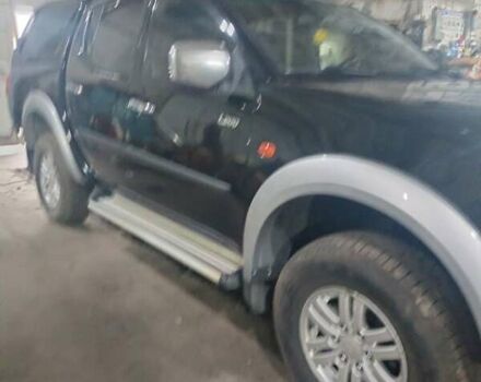 Чорний Міцубісі Л 200, об'ємом двигуна 2.5 л та пробігом 285 тис. км за 15000 $, фото 1 на Automoto.ua