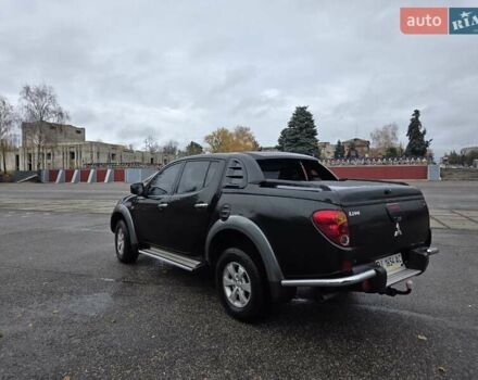 Чорний Міцубісі Л 200, об'ємом двигуна 2.48 л та пробігом 302 тис. км за 12500 $, фото 6 на Automoto.ua