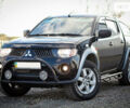 Черный Мицубиси Л 200, объемом двигателя 2.5 л и пробегом 260 тыс. км за 14500 $, фото 1 на Automoto.ua