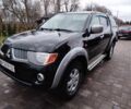 Чорний Міцубісі Л 200, об'ємом двигуна 2.5 л та пробігом 220 тис. км за 10500 $, фото 1 на Automoto.ua