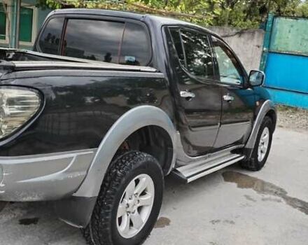Черный Мицубиси Л 200, объемом двигателя 2.48 л и пробегом 291 тыс. км за 11000 $, фото 5 на Automoto.ua