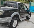 Черный Мицубиси Л 200, объемом двигателя 2.48 л и пробегом 291 тыс. км за 11000 $, фото 5 на Automoto.ua