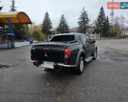 Чорний Міцубісі Л 200, об'ємом двигуна 2.48 л та пробігом 302 тис. км за 12500 $, фото 2 на Automoto.ua