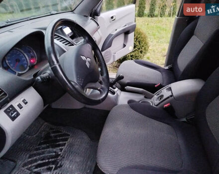 Чорний Міцубісі Л 200, об'ємом двигуна 2.48 л та пробігом 219 тис. км за 10500 $, фото 14 на Automoto.ua