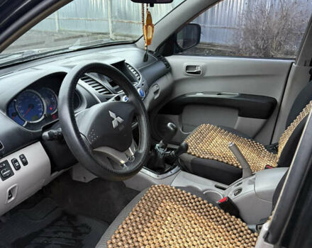 Черный Мицубиси Л 200, объемом двигателя 2.5 л и пробегом 261 тыс. км за 12300 $, фото 18 на Automoto.ua