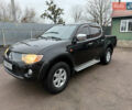Черный Мицубиси Л 200, объемом двигателя 2.5 л и пробегом 261 тыс. км за 12300 $, фото 10 на Automoto.ua