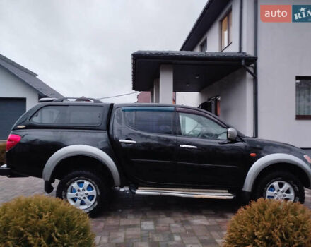 Чорний Міцубісі Л 200, об'ємом двигуна 2.48 л та пробігом 219 тис. км за 10500 $, фото 6 на Automoto.ua