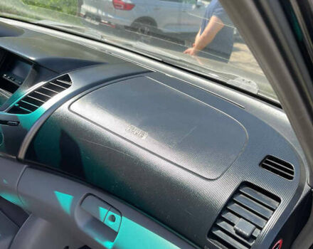 Черный Мицубиси Л 200, объемом двигателя 2.5 л и пробегом 221 тыс. км за 12800 $, фото 22 на Automoto.ua