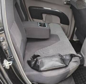 Черный Мицубиси Л 200, объемом двигателя 2.48 л и пробегом 291 тыс. км за 11000 $, фото 1 на Automoto.ua