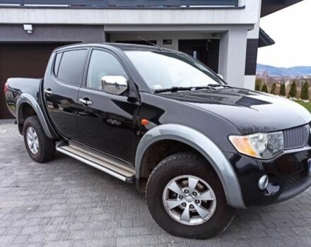 Черный Мицубиси Л 200, объемом двигателя 2.5 л и пробегом 270 тыс. км за 3424 $, фото 1 на Automoto.ua