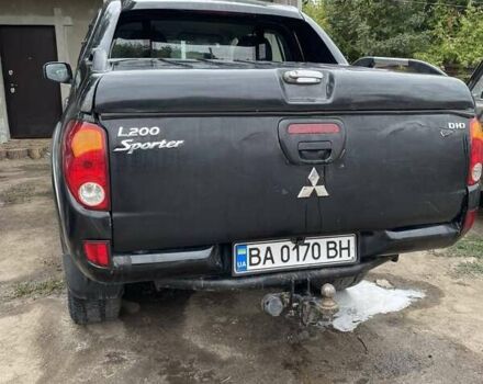 Черный Мицубиси Л 200, объемом двигателя 2.48 л и пробегом 376 тыс. км за 11500 $, фото 3 на Automoto.ua