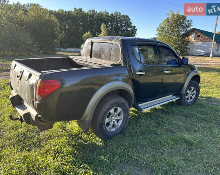 Черный Мицубиси Л 200, объемом двигателя 2.48 л и пробегом 320 тыс. км за 7500 $, фото 4 на Automoto.ua