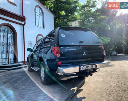 Черный Мицубиси Л 200, объемом двигателя 2.5 л и пробегом 221 тыс. км за 12800 $, фото 7 на Automoto.ua