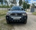 Черный Мицубиси Л 200, объемом двигателя 2.48 л и пробегом 211 тыс. км за 15800 $, фото 1 на Automoto.ua