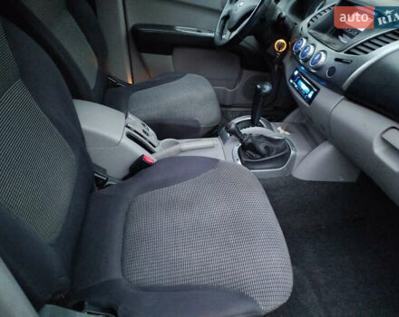 Чорний Міцубісі Л 200, об'ємом двигуна 2.48 л та пробігом 219 тис. км за 10500 $, фото 19 на Automoto.ua