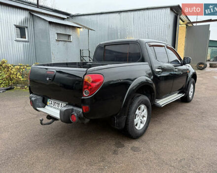 Черный Мицубиси Л 200, объемом двигателя 2.5 л и пробегом 261 тыс. км за 12300 $, фото 12 на Automoto.ua