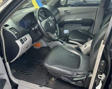 Черный Мицубиси Л 200, объемом двигателя 2.48 л и пробегом 210 тыс. км за 16500 $, фото 7 на Automoto.ua