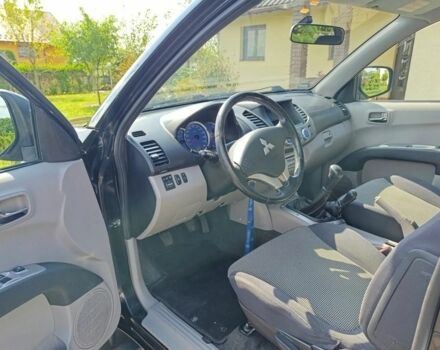 Черный Мицубиси Л 200, объемом двигателя 2.5 л и пробегом 230 тыс. км за 3150 $, фото 5 на Automoto.ua