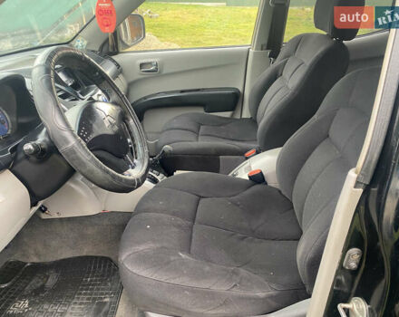 Черный Мицубиси Л 200, объемом двигателя 0 л и пробегом 409 тыс. км за 9500 $, фото 7 на Automoto.ua