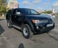 Чорний Міцубісі Л 200, об'ємом двигуна 2.5 л та пробігом 234 тис. км за 12500 $, фото 1 на Automoto.ua