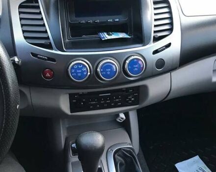 Черный Мицубиси Л 200, объемом двигателя 2.5 л и пробегом 270 тыс. км за 13000 $, фото 9 на Automoto.ua