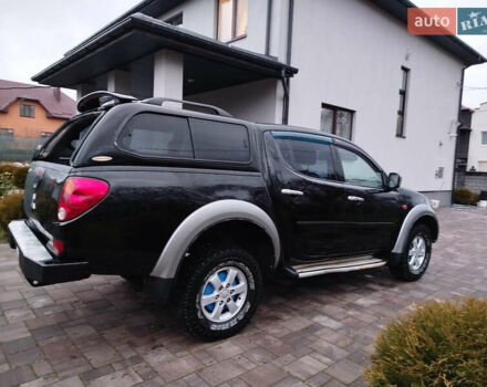 Чорний Міцубісі Л 200, об'ємом двигуна 2.48 л та пробігом 219 тис. км за 10500 $, фото 27 на Automoto.ua