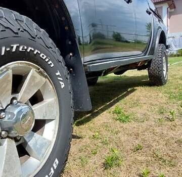 Черный Мицубиси Л 200, объемом двигателя 2.48 л и пробегом 392 тыс. км за 15500 $, фото 12 на Automoto.ua