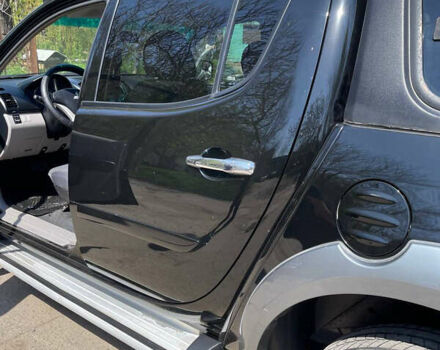 Черный Мицубиси Л 200, объемом двигателя 2.5 л и пробегом 221 тыс. км за 12800 $, фото 17 на Automoto.ua