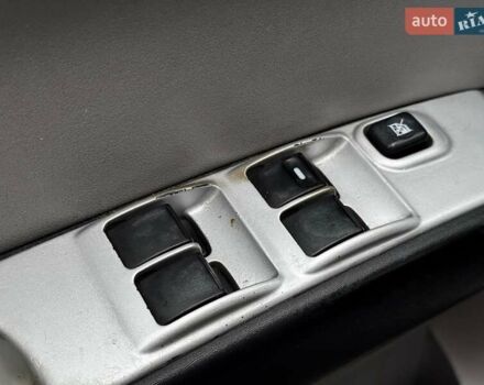 Черный Мицубиси Л 200, объемом двигателя 2.5 л и пробегом 330 тыс. км за 9890 $, фото 9 на Automoto.ua