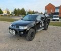 Черный Мицубиси Л 200, объемом двигателя 2.5 л и пробегом 213 тыс. км за 3006 $, фото 1 на Automoto.ua