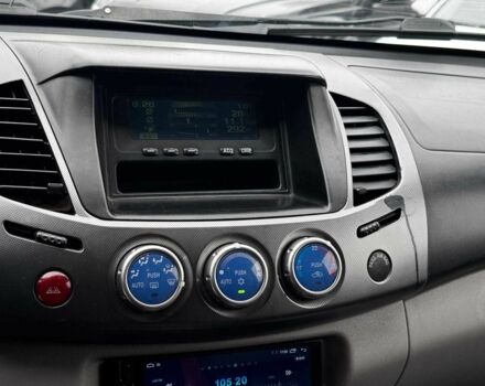 Чорний Міцубісі Л 200, об'ємом двигуна 2.5 л та пробігом 330 тис. км за 9890 $, фото 15 на Automoto.ua