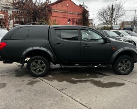 Чорний Міцубісі Л 200, об'ємом двигуна 2.5 л та пробігом 330 тис. км за 9890 $, фото 6 на Automoto.ua