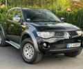 Черный Мицубиси Л 200, объемом двигателя 2.5 л и пробегом 200 тыс. км за 4000 $, фото 1 на Automoto.ua