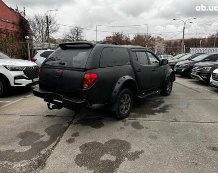 Чорний Міцубісі Л 200, об'ємом двигуна 2.5 л та пробігом 330 тис. км за 9890 $, фото 5 на Automoto.ua