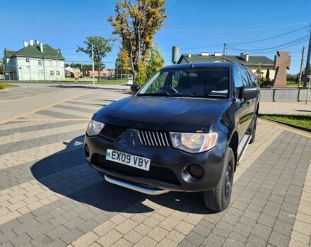 Черный Мицубиси Л 200, объемом двигателя 2.5 л и пробегом 140 тыс. км за 7298 $, фото 5 на Automoto.ua