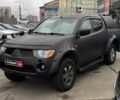 Чорний Міцубісі Л 200, об'ємом двигуна 2.5 л та пробігом 330 тис. км за 9890 $, фото 1 на Automoto.ua