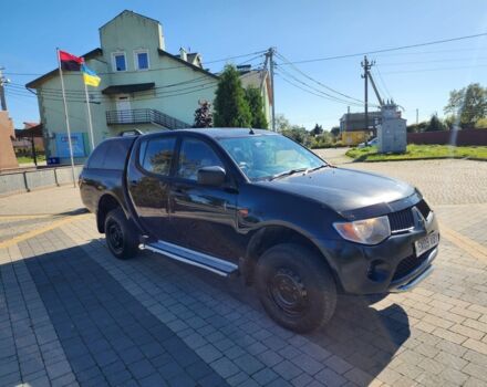 Черный Мицубиси Л 200, объемом двигателя 2.5 л и пробегом 140 тыс. км за 7298 $, фото 2 на Automoto.ua