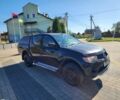 Черный Мицубиси Л 200, объемом двигателя 2.5 л и пробегом 140 тыс. км за 7298 $, фото 2 на Automoto.ua