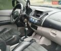 Черный Мицубиси Л 200, объемом двигателя 2.48 л и пробегом 260 тыс. км за 9500 $, фото 20 на Automoto.ua