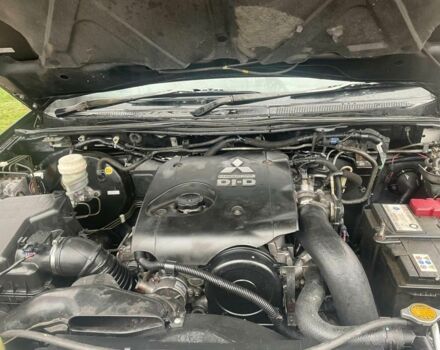 Черный Мицубиси Л 200, объемом двигателя 2.5 л и пробегом 145 тыс. км за 6800 $, фото 16 на Automoto.ua