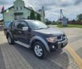 Черный Мицубиси Л 200, объемом двигателя 2.5 л и пробегом 78 тыс. км за 8138 $, фото 1 на Automoto.ua
