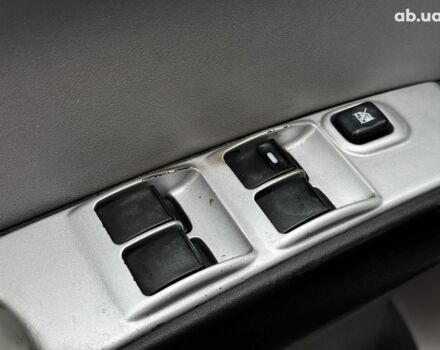 Чорний Міцубісі Л 200, об'ємом двигуна 2.5 л та пробігом 330 тис. км за 9890 $, фото 9 на Automoto.ua