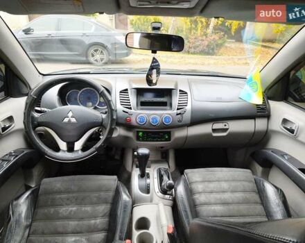 Черный Мицубиси Л 200, объемом двигателя 2.48 л и пробегом 260 тыс. км за 9500 $, фото 18 на Automoto.ua