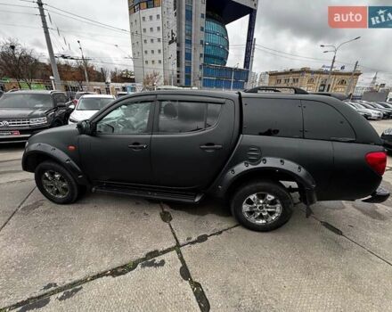 Черный Мицубиси Л 200, объемом двигателя 2.5 л и пробегом 330 тыс. км за 9890 $, фото 7 на Automoto.ua