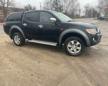 Черный Мицубиси Л 200, объемом двигателя 2.5 л и пробегом 145 тыс. км за 6800 $, фото 1 на Automoto.ua