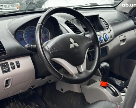 Чорний Міцубісі Л 200, об'ємом двигуна 2.5 л та пробігом 330 тис. км за 9890 $, фото 11 на Automoto.ua