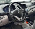 Чорний Міцубісі Л 200, об'ємом двигуна 2.5 л та пробігом 330 тис. км за 9890 $, фото 11 на Automoto.ua